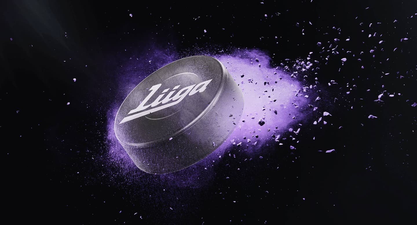 Hockey puck with Liiga logo surrounded by purple explosion effect against black background.